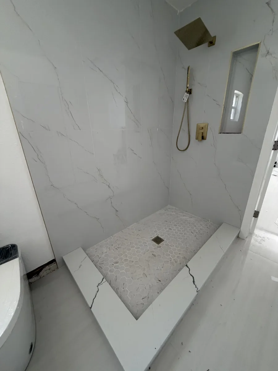 Shower tile installation in progress